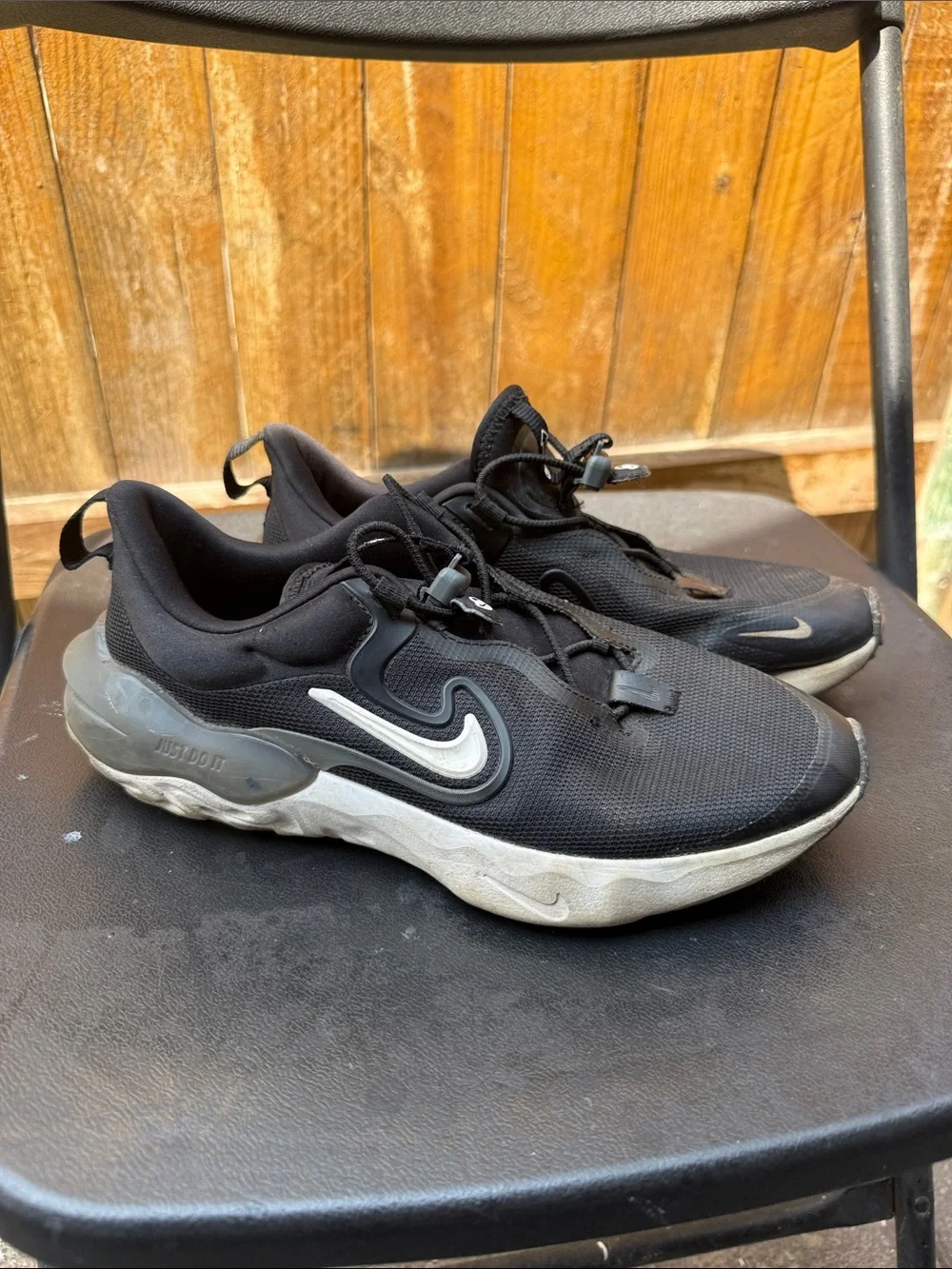 Nike Kids Black Sneakers with White Swoosh